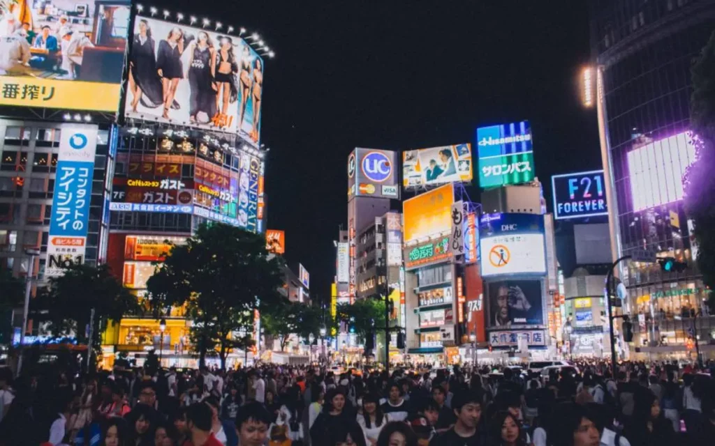 A city street lit up at night