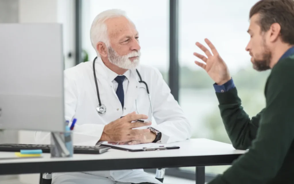 A doctor talking with a patient