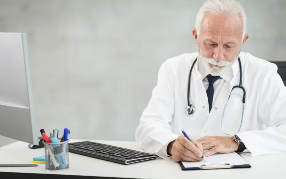 Writing up notes at a desk
