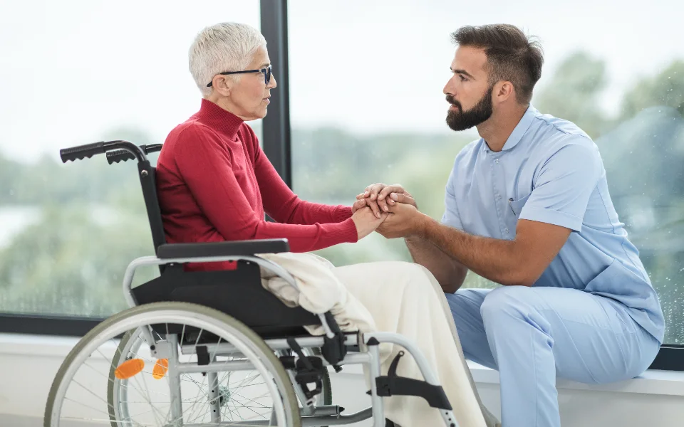 Carer assisting a patient