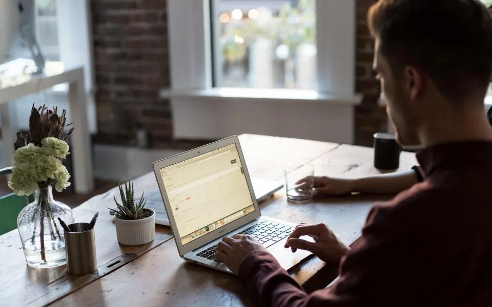 A person working at a laptop